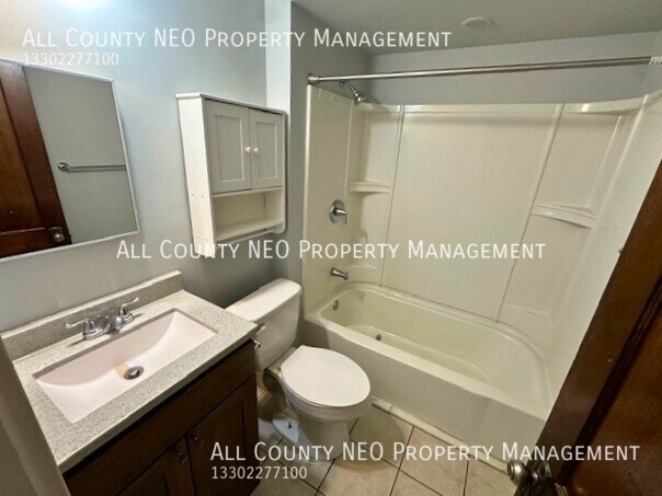 Building Photo - Cozy 2-Bedroom with Ample Storage and Char...