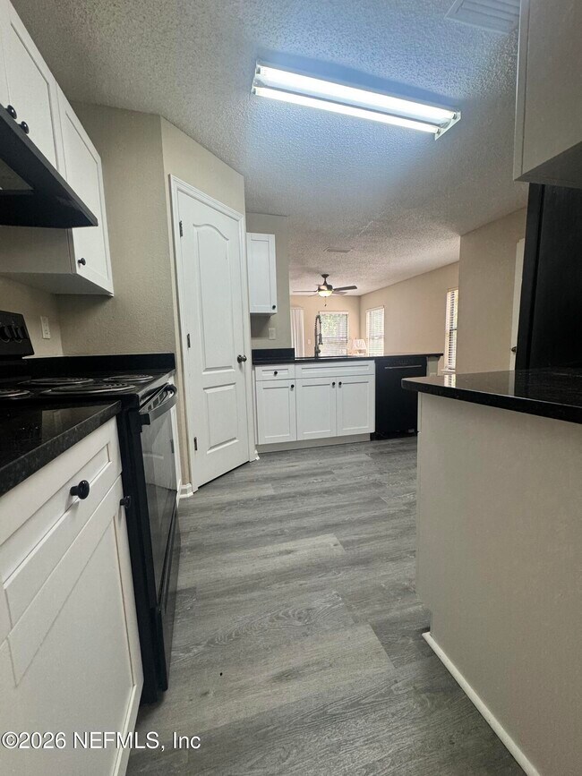 Building Photo - 7772 Playschool Ln