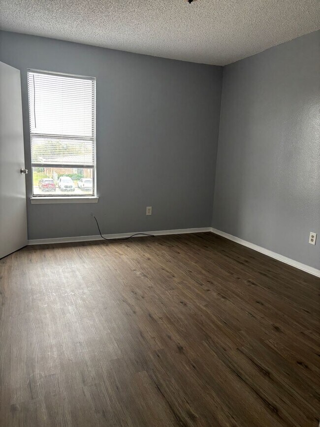 Building Photo - Affordable, Gated Community with Updated 2-Bedroom, 1.5-Bath