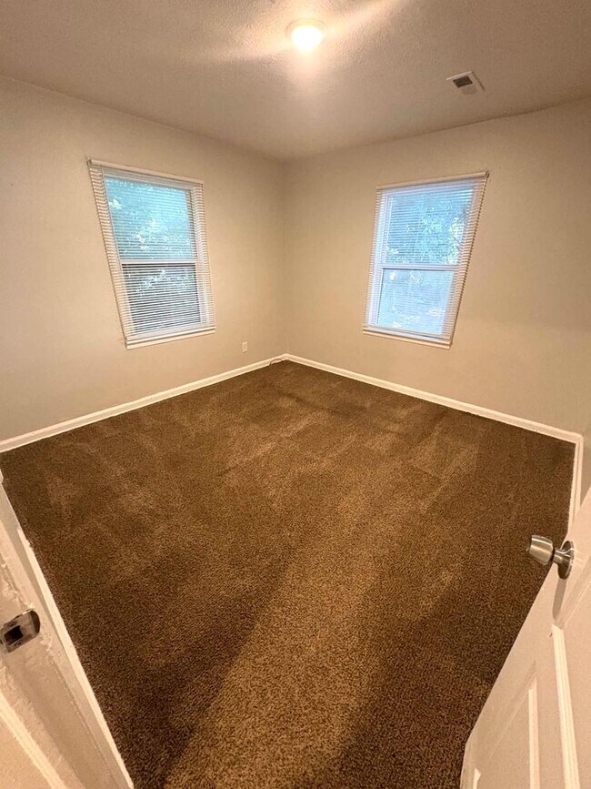 Building Photo - Welcome to Your Next Home with Harvest Management