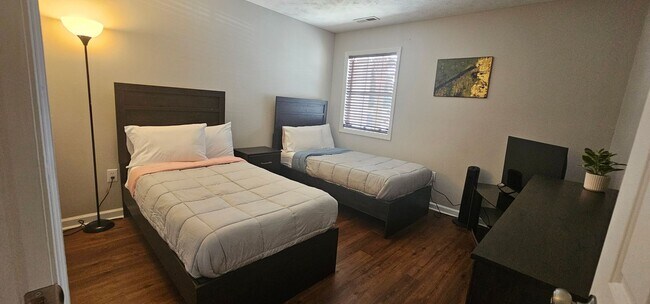 Building Photo - -First-Floor End-Unit | Fully Furnished 2B...