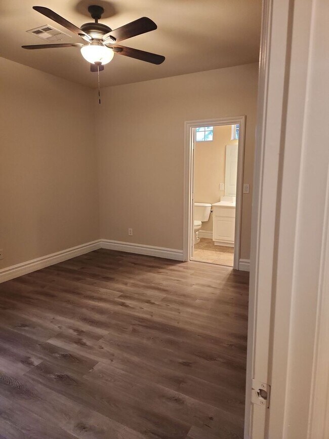 Building Photo - A Stunning 4 Bedroom Home with a Sparkling Pool