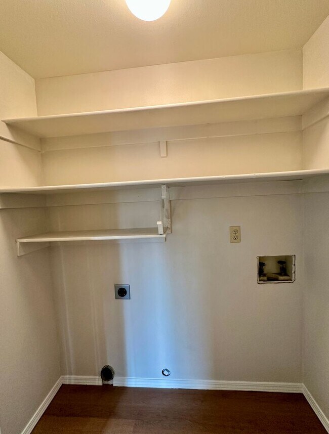 Building Photo - For Rent: Cozy 2 Bed / 2 Bath Condo with Enclosed Yard & Detached Garage