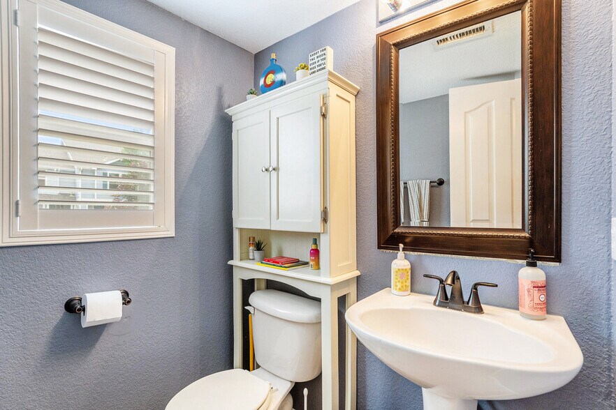 Half bathroom downstairs on main floor - 5796 Biscay St