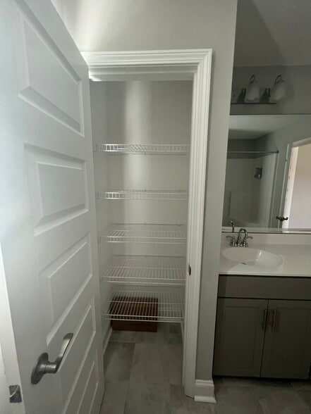 Linen closet in master bath - 1230 Big Field Dr