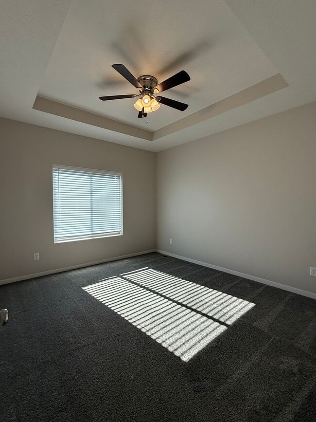 Building Photo - Walkout ranch townhome with 2 stall garage. Spacious 2 bedrooms with walk in closets, 2.5 bathroo...