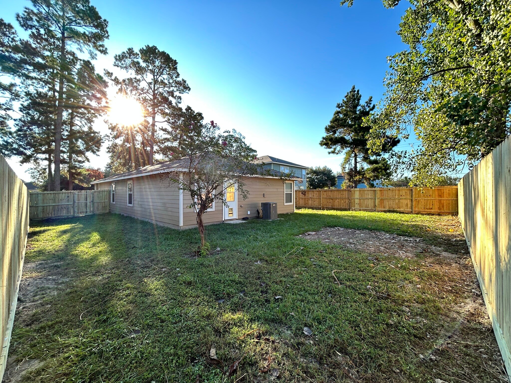 Backyard with New Fence - 16782 Fallen Timbers Dr