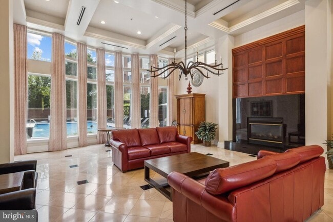 Building Photo - This townhouse style condo is located across the street from the Vienna Metro Station (Orange Line).
