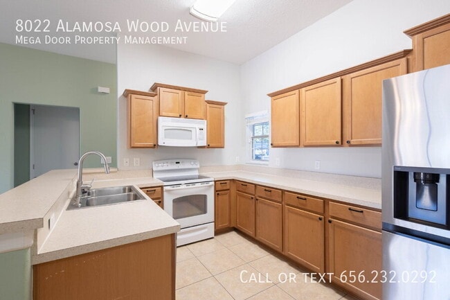 Building Photo - 8022 Alamosa Wood Ave