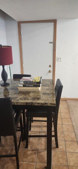 View#6 of downstairs livingroom and garage door - 2116 Thaler Ave