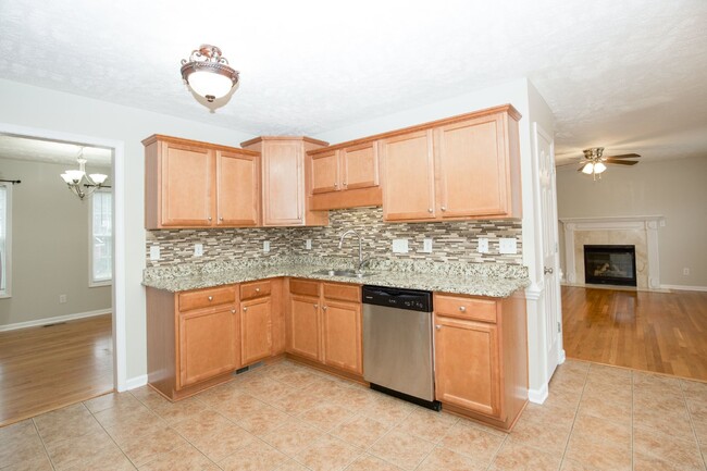 Building Photo - "Charming 4-Bedroom Home with Granite Coun...