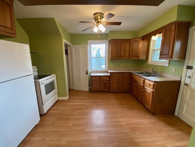 Building Photo - Fenced Yard + Porch in Goodyear Heights—3BR Charmer