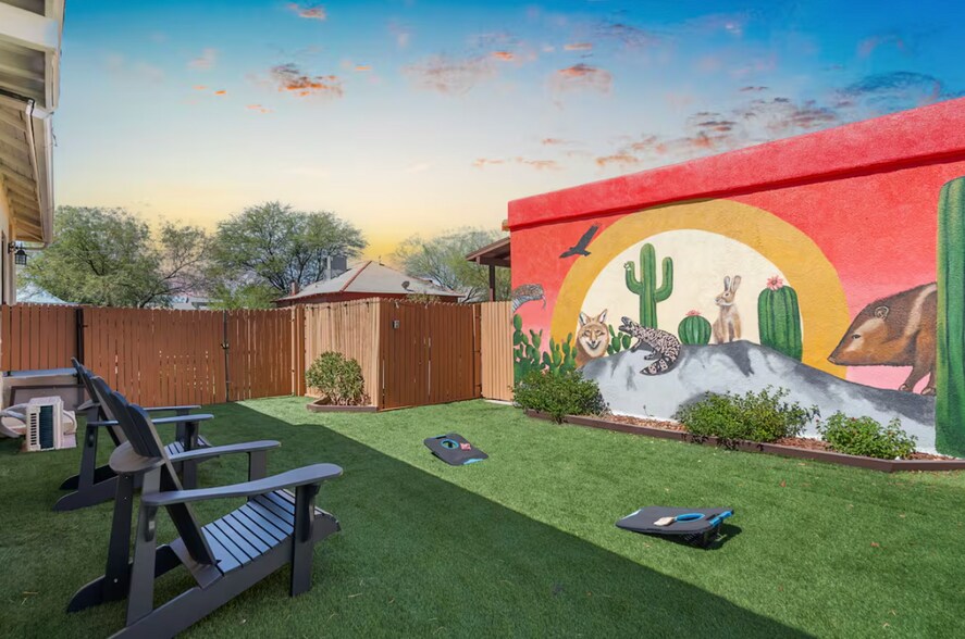 Backyard with mural and new turf - 311 N 3rd Ave
