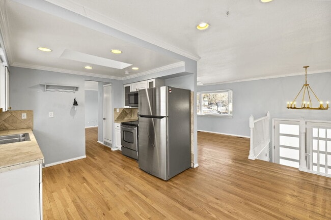 Building Photo - Spacious Split-Level Home with Beautiful Kitchen, Large Deck, and Fully Fenced Yard