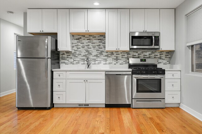 Quality Kitchens with Quartz Countertops - 2440 W 24th Pl
