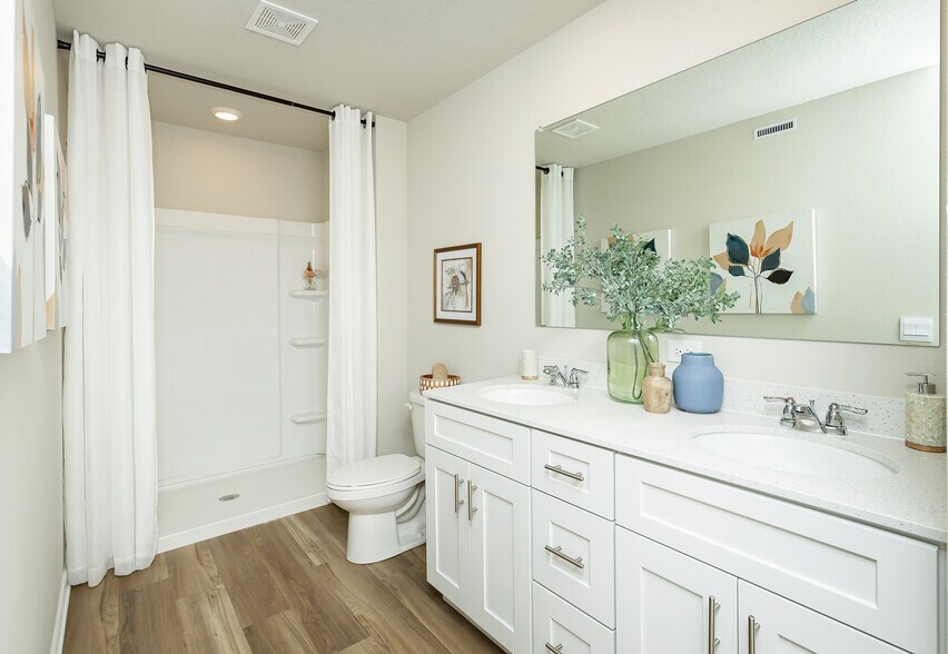 Master Bath Double Vanity - this home is not furnished - 4302 NE 13th St