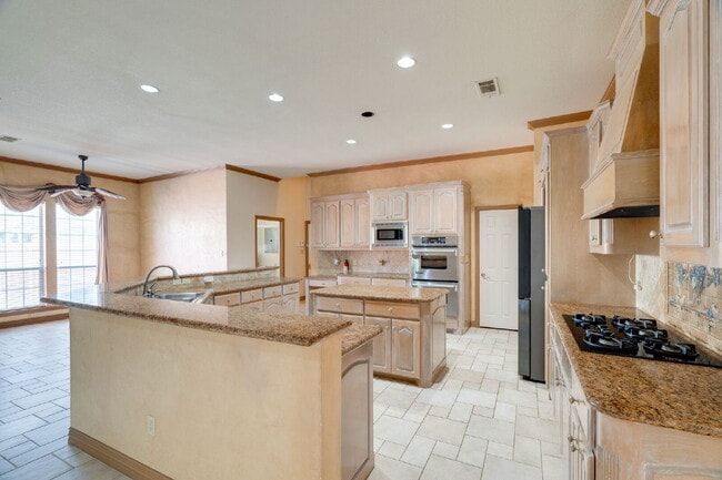 Building Photo - "Stately Gated 5-Bedroom Estate With Pool, Custom Details & Abundant Living Space!"