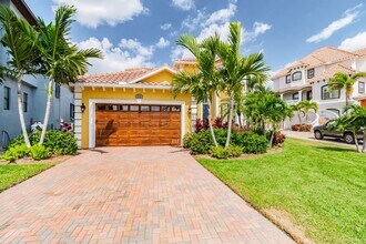 Building Photo - FURNISHED WATERFRONT 4 BED 3 BATH POOL HOM...
