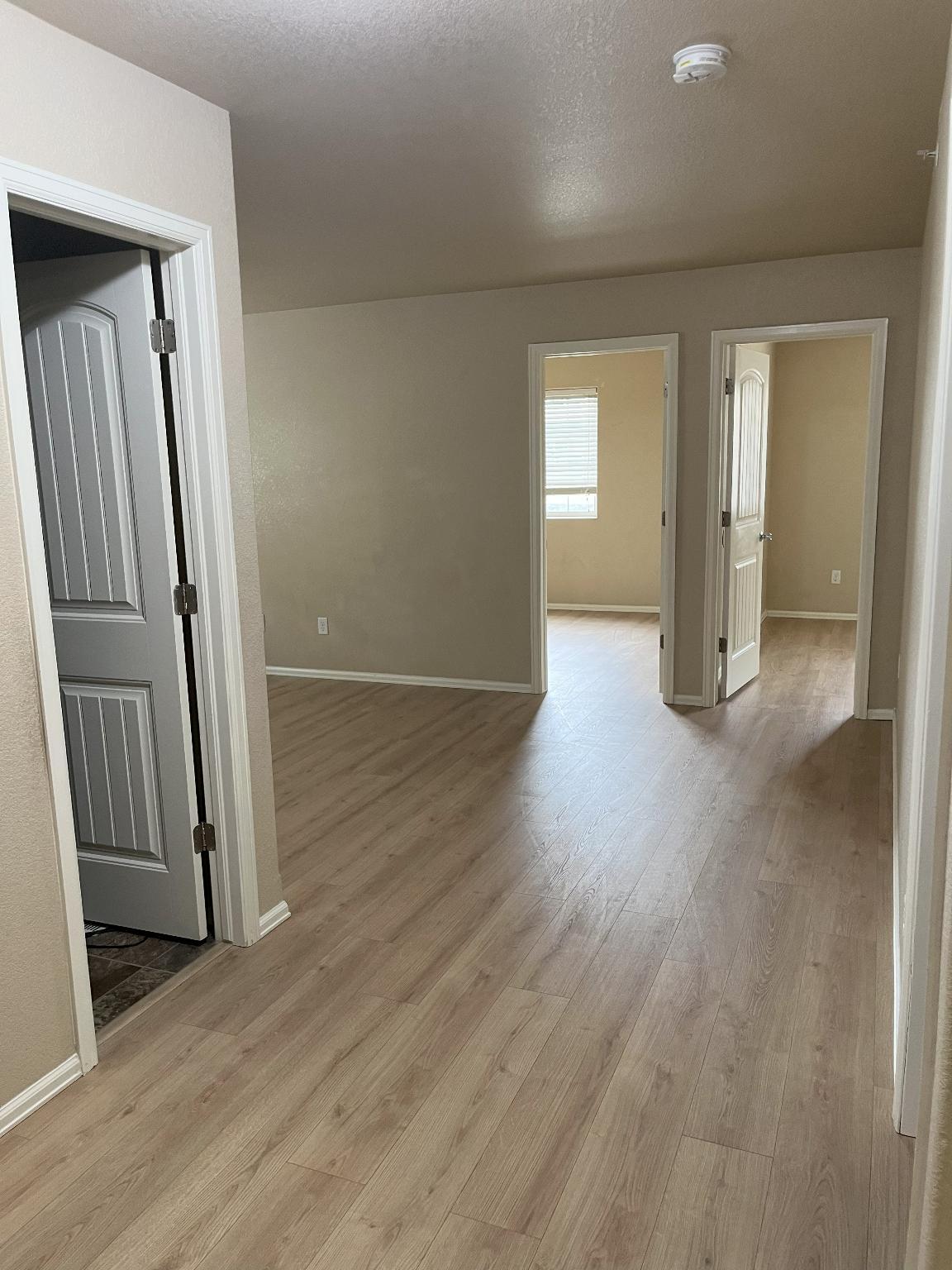 hall looking towards loft and secondary bedrooms - 3070 Harpy Grove