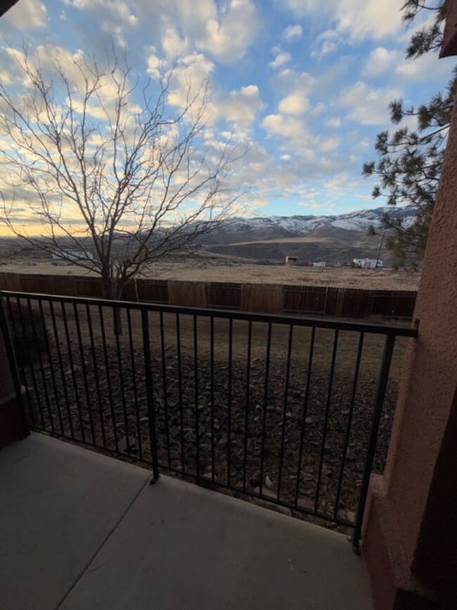 Building Photo - Discover Your Dream Condo with Stunning Mountain Views a 1 Car Garage & Covered carport in NW Ren...