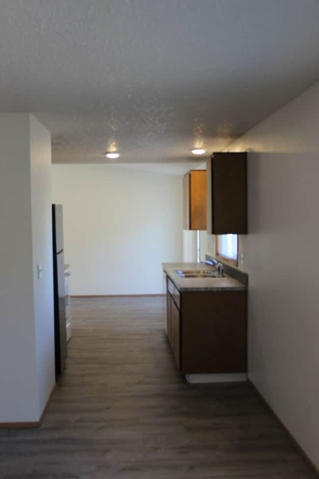 Building Photo - 4 BR, 2 1/2 BA home with fenced yard in qu...