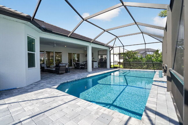 Building Photo - Price improved: luxury pool home in Esplanade at Azario · $6,500/mo