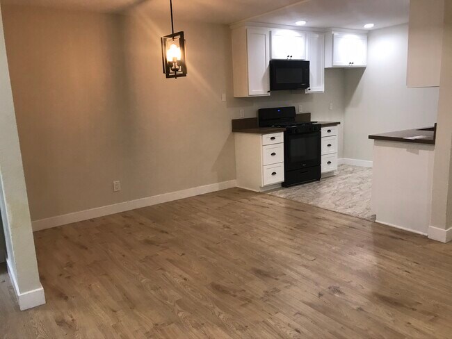 Kitchen with quartz countertops and brand new appliances - 3414 Jasmine Ave