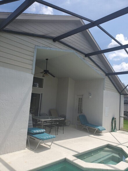 covered lanai at rear - 2651 Oneida Loop