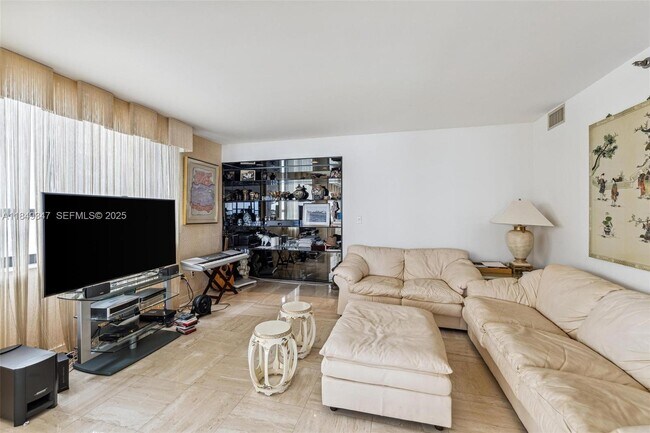 Building Photo - 10175 Collins Ave