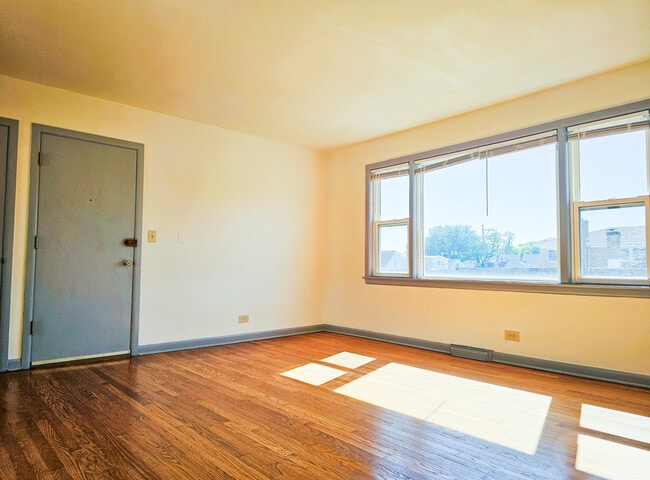 Building Photo - 5950 W Schubert Ave
