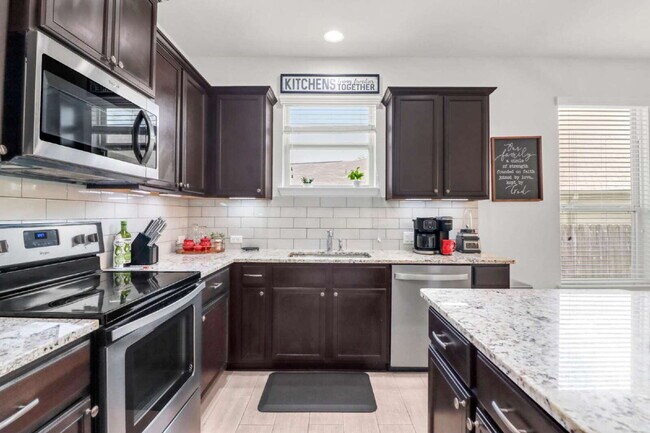 Building Photo - "Charming 3-Bedroom San Antonio Home with Granite Elegance - 1854 Sq Ft of Comfort!"