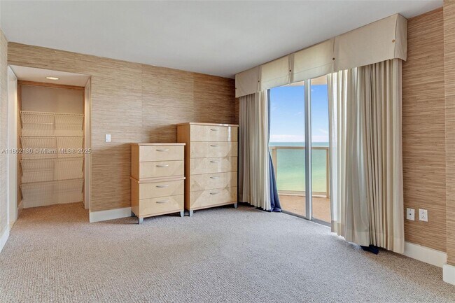 Building Photo - 6423 Collins Ave