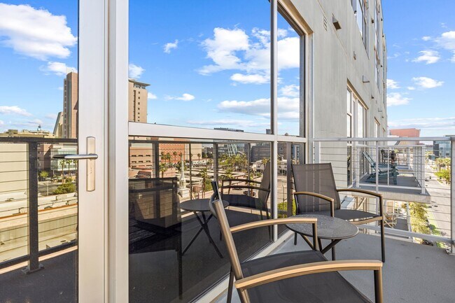 Building Photo - Furnished Juhl Condo w/ Balcony & City Views