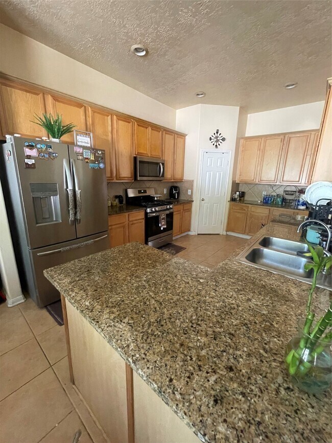 Building Photo - 26864 Calgary Pointe Dr