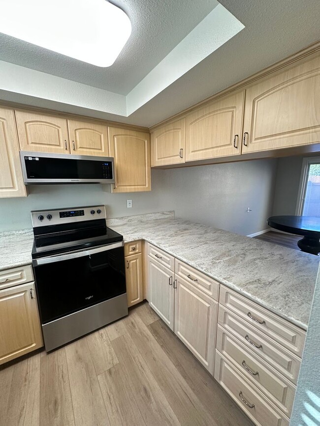 Building Photo - 2BR/1.5BA 2-story condo in El Cajon, gated community with sparkling pool, 2 car attached garage, ...