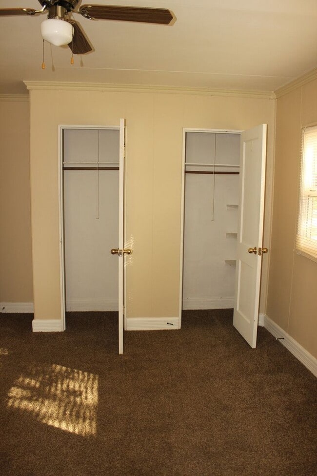 Building Photo - PRELEASING for AUGUST! Walk to Ball State! Spacious 4BR with Fenced Yard & Garage