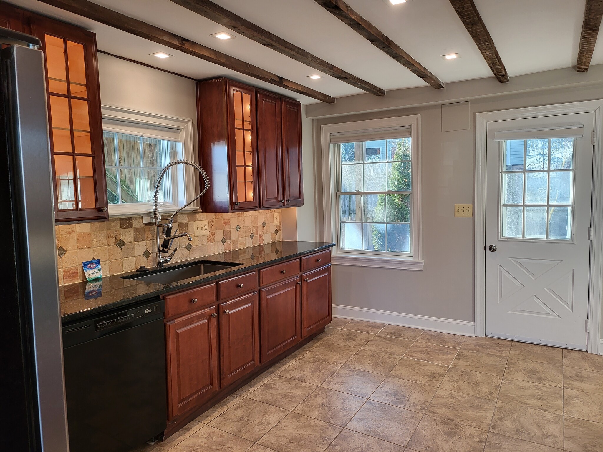 Sink and rear of building facing yard - 731 N Stokes St