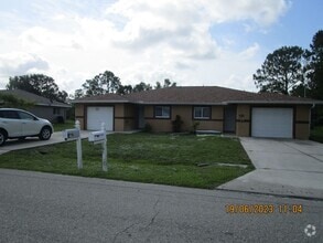 Building Photo - Avail Now-Lehigh Acres Duplex