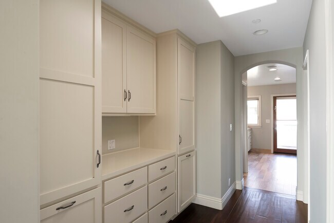 Hallway with Storage and 2 Walk In Closets in Primary Bedroom - 620 13th St