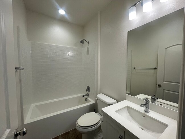 Building Photo - Beautifully upgraded townhome with 2-car i...