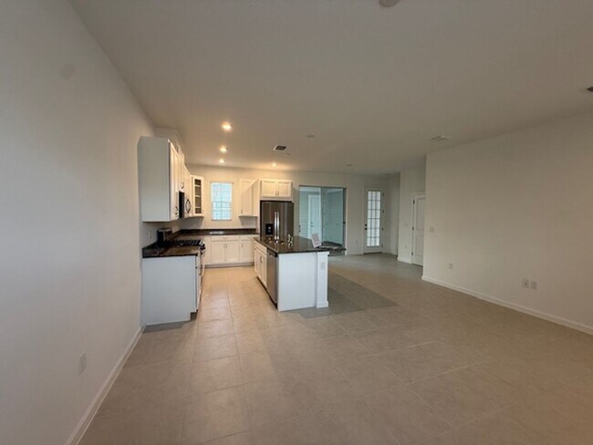 Building Photo - Brand new construction 3 Bedroom Town Home in Island Village of Celebration