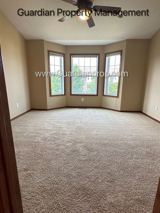 Building Photo - Pet Free Champlin Town Home, 3.5 Baths, 2 Car Garage, Dishwasher, Balcony, Available end of April