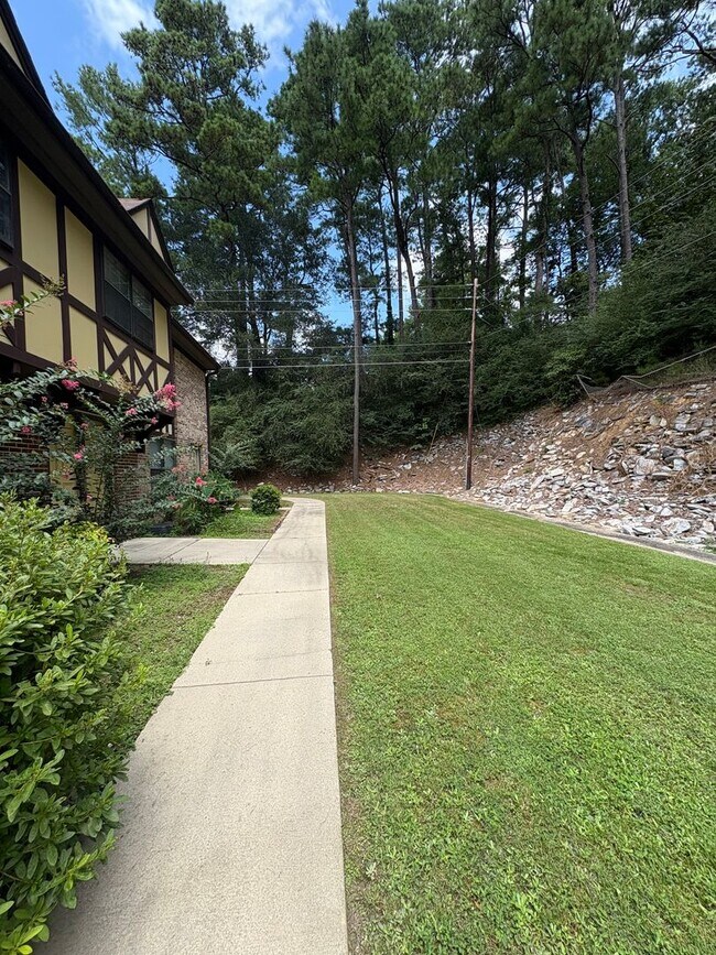 Building Photo - Four Bedroom Townhome Available Now