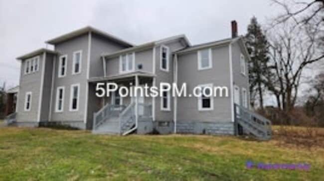 Building Photo - 9804 Miles Ave