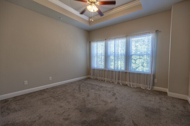 Building Photo - Ground-Floor Condo with Garage in Quail Ho...