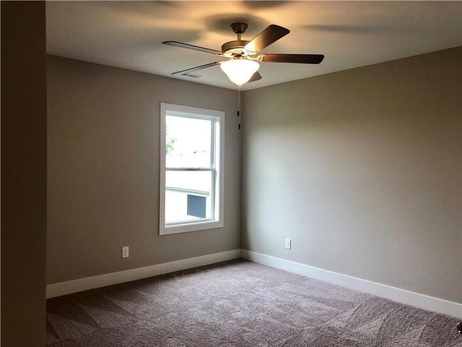 Building Photo - COMING SOON: Modern 3-Bedroom Townhome wit...