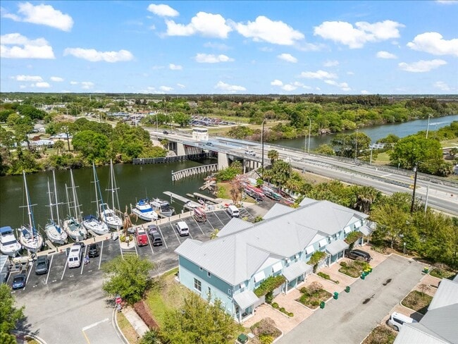 Building Photo - Coastal Living with Marina Views in Cape Crossing