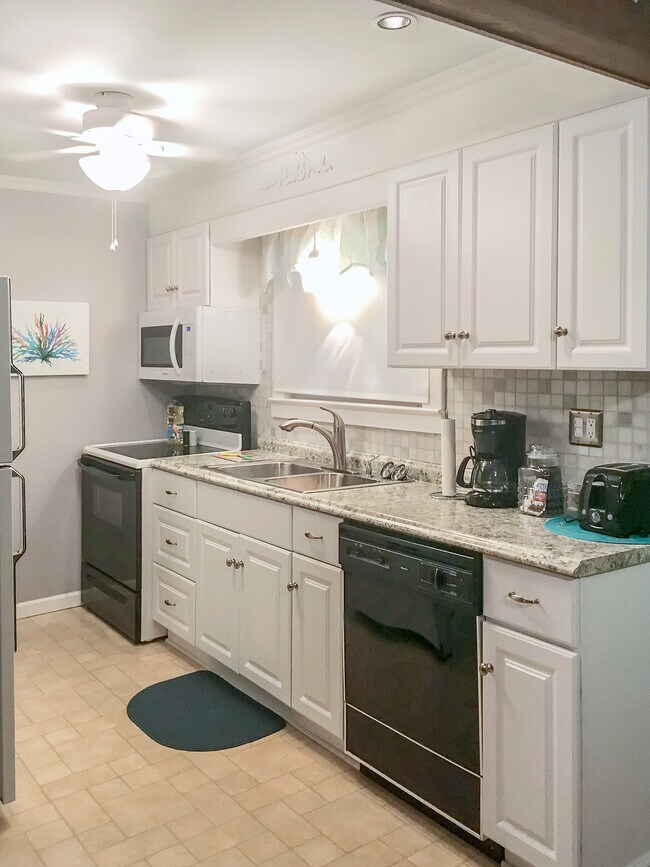 New kitchen cabinets, all appliances large and small - 3061 Maple Ave