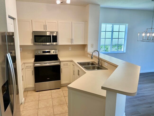 Building Photo - 5119 SE Mariner Garden Cir