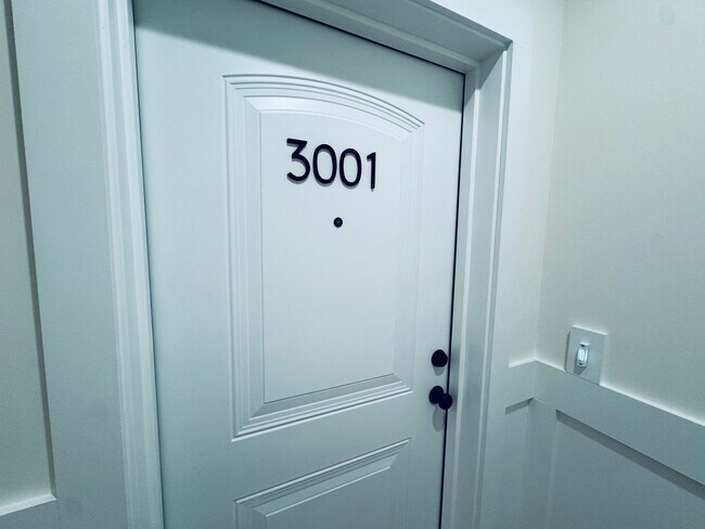 Building Photo - Brand New Luxury Condo - Top Floor